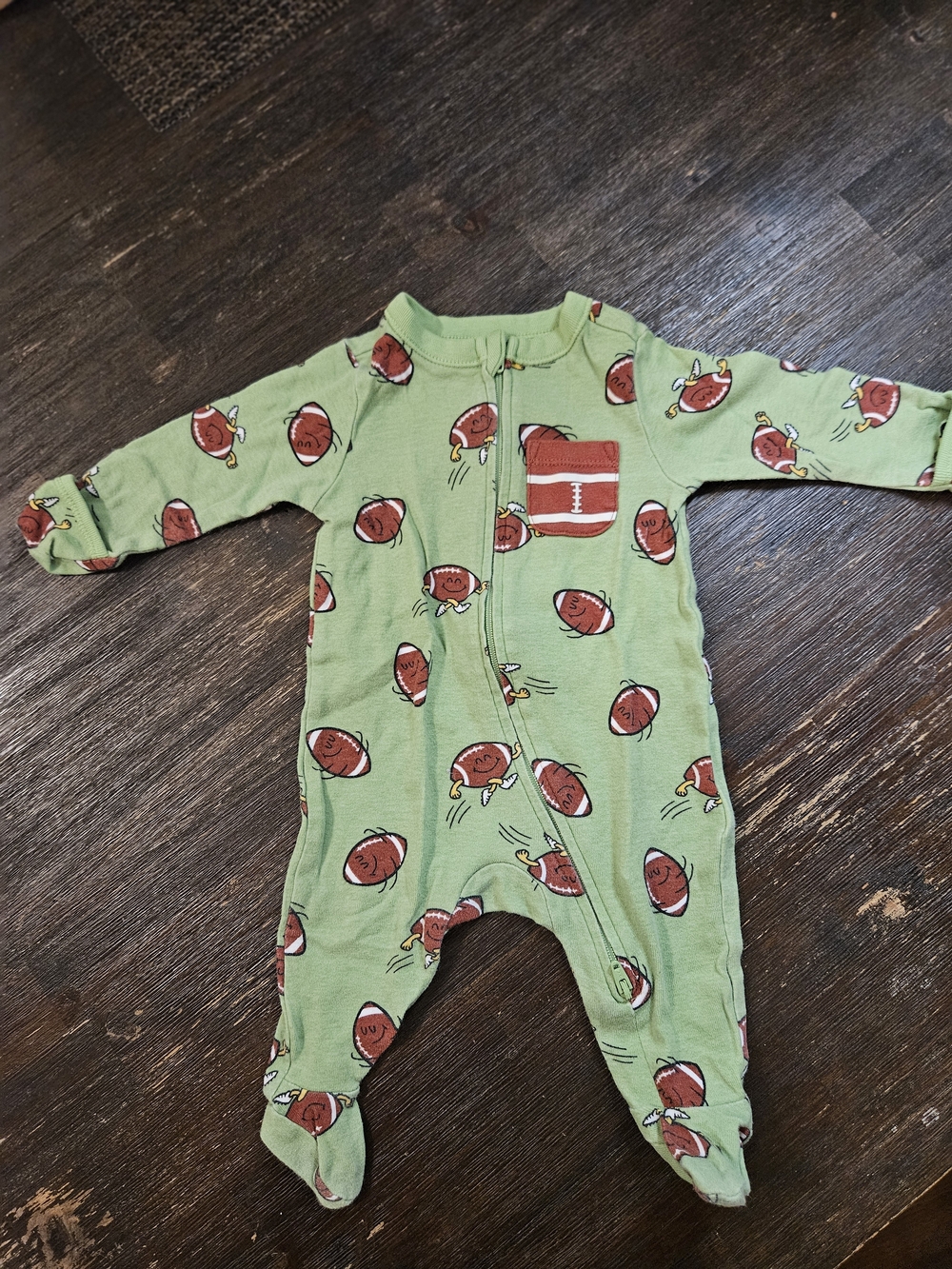 Old Navy Green Footed One-Piece with Brown Footballs